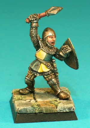 Pose 1. This is the unmounted version of the figure, a fighter wearing a combination of plate and chainmail, a plain conical helmet with chainmail coif and a cloth tabard. He wields a footman's mace in his right hand and carries a scabbarded sword at his belt.